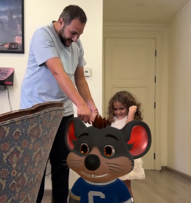Our co-founder and his daughter with their AR companion at home
